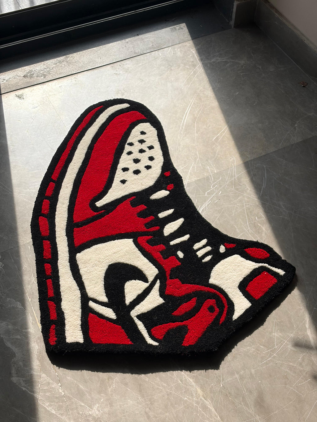 Red nike sneakers rug